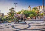 The famous bronze Bull statue (Boğa Heykeli) at the Altıyol intersection, a key meeting point in the heart of the Kadıköy district on the Asian side of Istanbul.