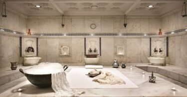Traditional Turkish hammam interior white marble soap foam